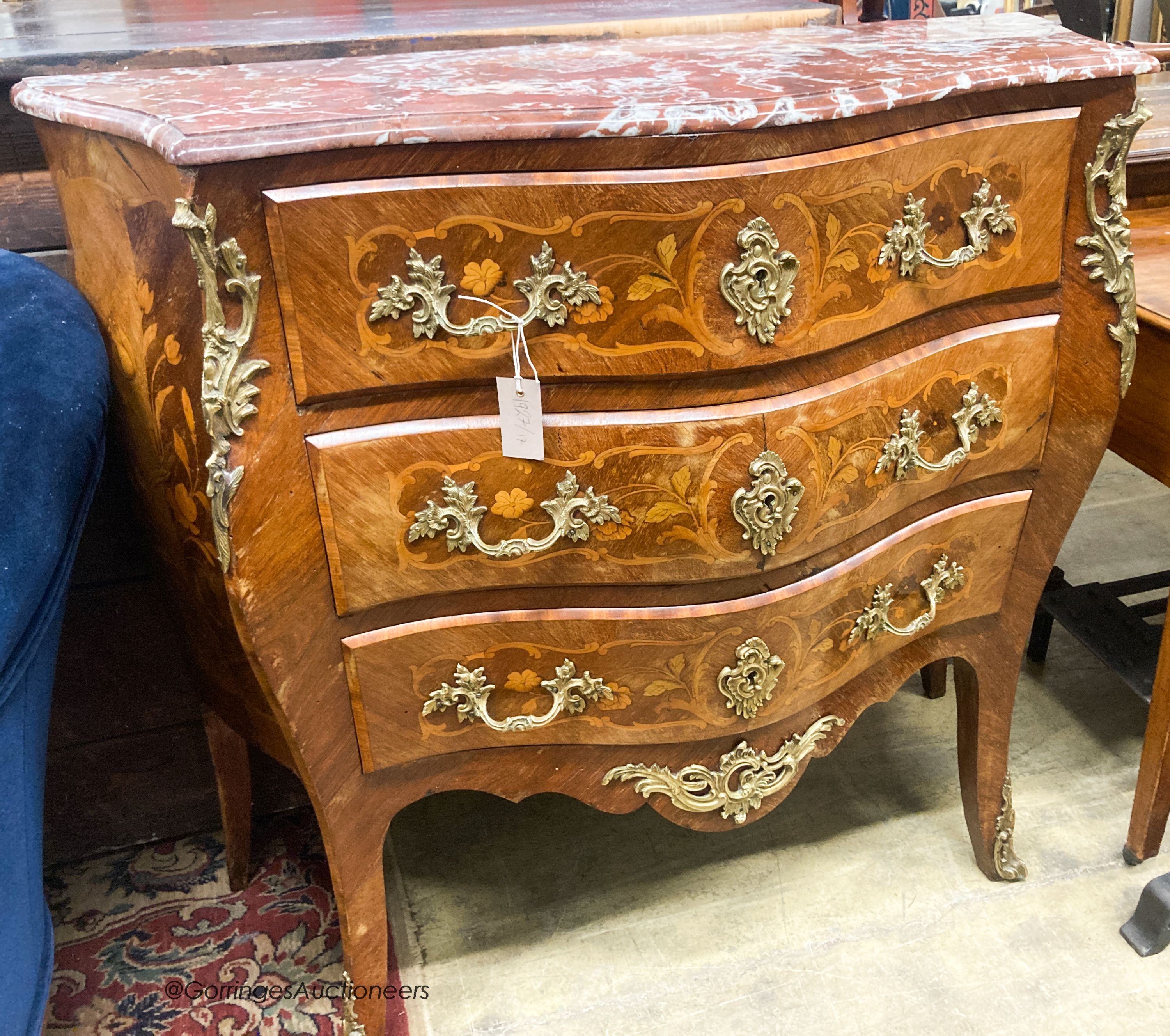 A Louis XV style marquetry inlaid marble top bombe commode, W.110cm D.45cm H.100cm